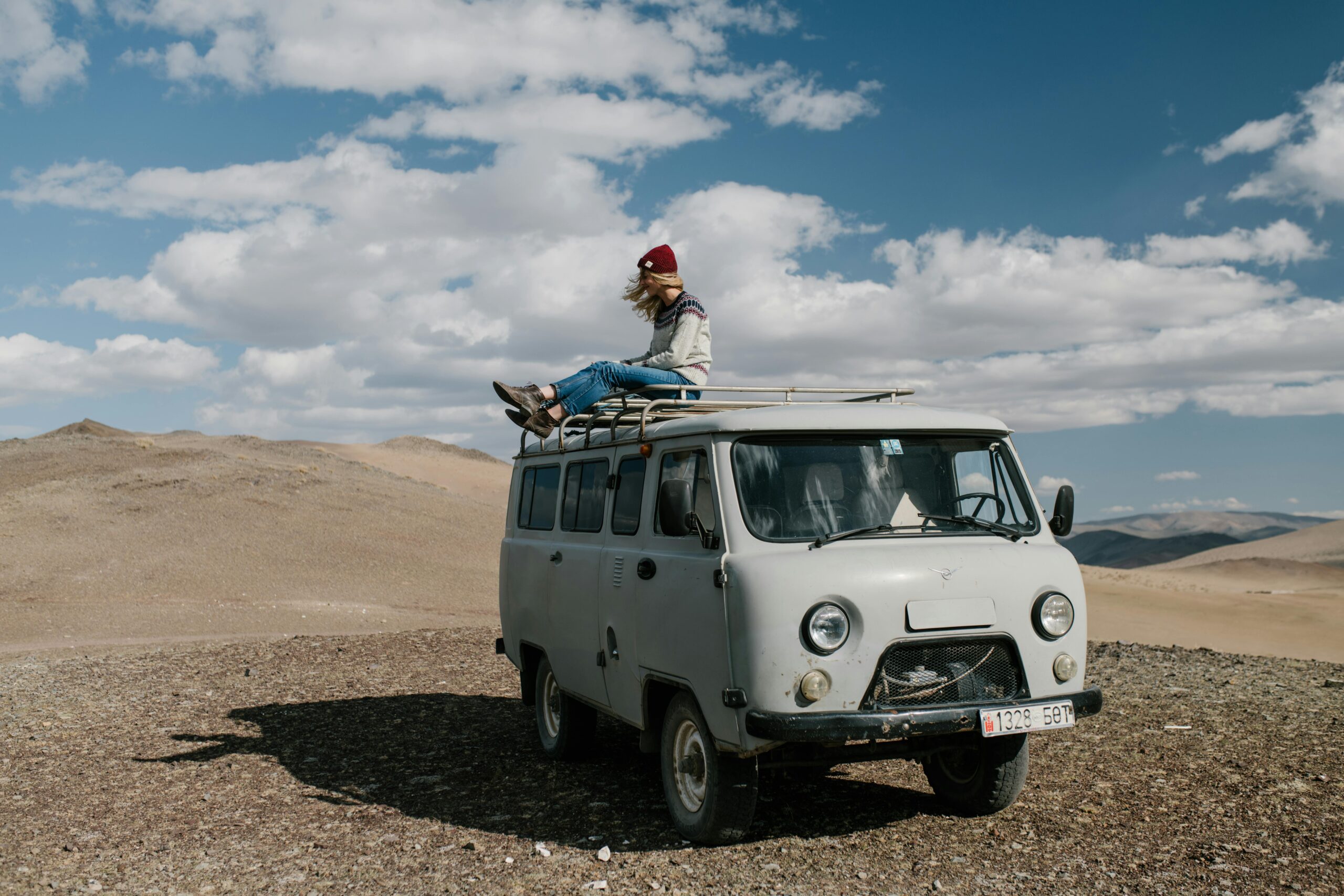 Van lifer embracing the freedom of the road with an open mind, essential for overcoming challenges and enjoying van life.